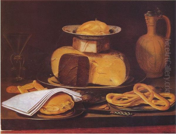Still life with cheesestack, a bun and pretzels - view 1