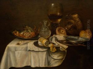 Still life with crab bread and lemon, with roemer, perfume bottle and pewter plates by Pieter Claesz