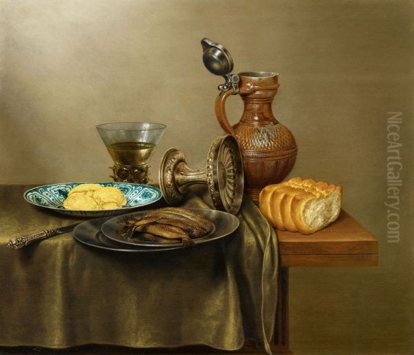 Stilleven van gerookte haring en brood op tinnen en porseleinen vaatwerk met gevulde berkemeier, omgevallen tazza en stenen kan op een tafelkleed op een houten tafel - view 1