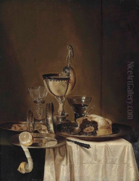 Still life of blackberry pie, pewter platter, roemer, tazza, lemon, olives and a nautilus cup - view 1