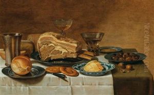Still life with cut of meat, butter, chestnuts, glassware and bread on a table by Floris van Schooten