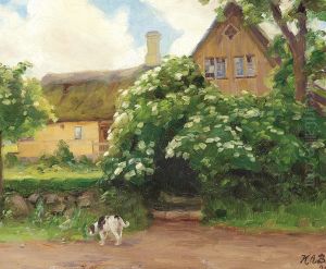 Elderberries in bloom and a dog at the entrance to a thatched farmhouse. Elderberries in bloom and a dog at the entrance to a thatched farmhouse.