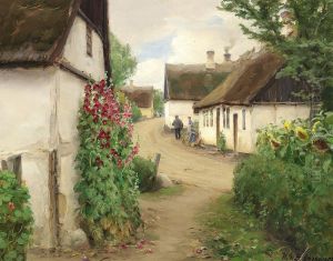 Summer day in a village with sunflowers and red hollyhocks.