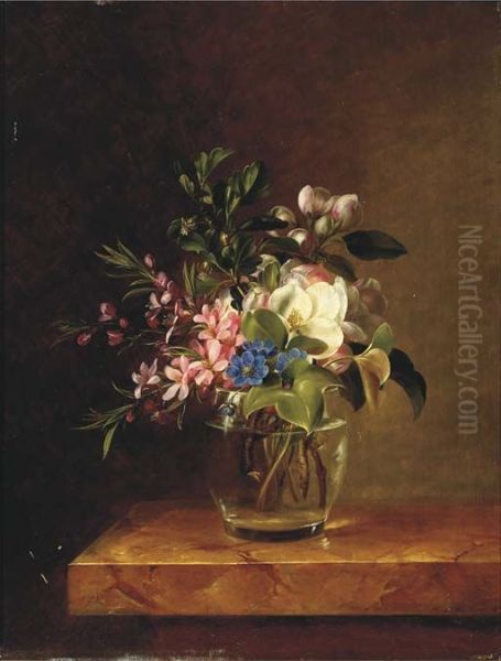 Springblossom in a glass on a marble ledge. - view 1