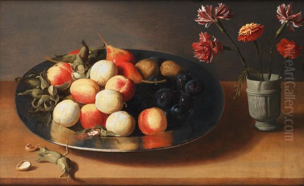 Peaches, pears, nuts and a vase of carnations on a table top - view 1