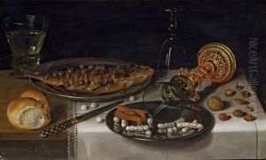 Nature morte au Roemer avec un hareng, un pain, une coupe renverse et des sucreries
