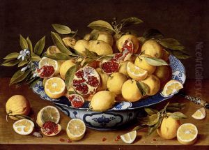 A Still Life Of A Wanli Kraak Porcelain Bowl Of Citrus Fruit And Pomegranates On A Wooden Table A Still Life Of A Wanli Kraak Porcelain Bowl Of Citrus Fruit And Pomegranates On A Wooden Table