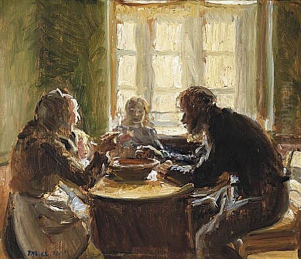 The Wollesen Family eating at their table. - view 1