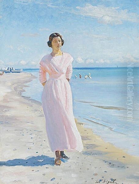 Young woman wearing a pink dress on the South beach of Skagen. - view 1