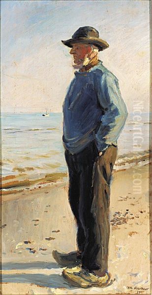 Fisherman of Skagen standing on the beach in a blue anorak. - view 1