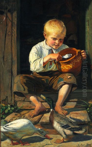 A boy feeding the ducks - view 1