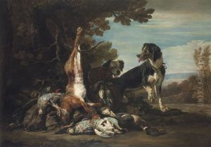Still life of game, with two dogs, in a landscape by David de Coninck