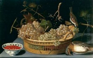 A still life of a basket of grapes, with a sparrow and a thrush and fraises-de-bois in a blue-and-white porcelain bowl upon a table top