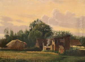 Evening landscape with sheds and trees.