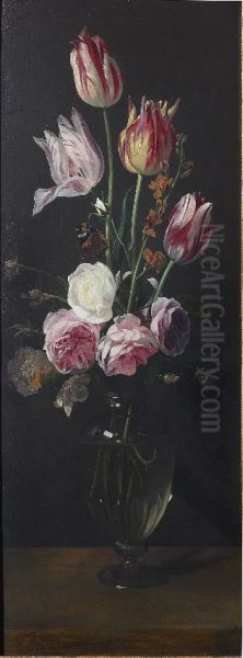 Roses, tulips and a wallflower in a glass vase - view 1