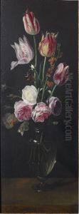 Roses, tulips and a wallflower in a glass vase Roses, tulips and a wallflower in a glass vase