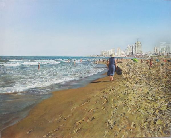 A woman walking on the beach - view 1
