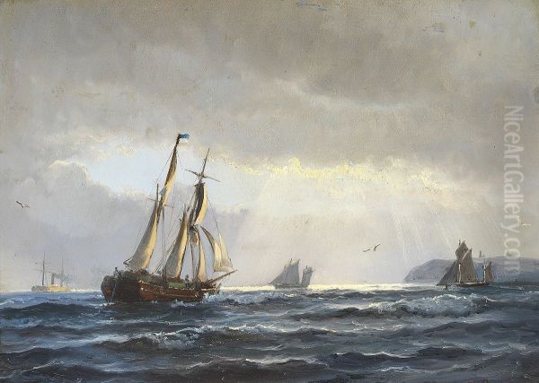 Sailing ships off a coast, the sun is breaking through the clouds. - view 1