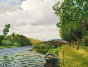 A view of the river at Odense, with a boat.