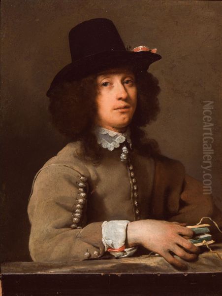 Portrait of a young man with a hat holding a book - view 1