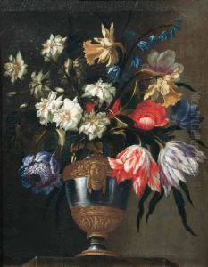 Flowers in a vase with a sculpted mask (2)