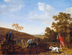 Landscape with a huntsman and his hounds attacking a fox