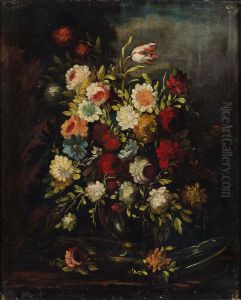 Flowers in a vase on a stone ledge