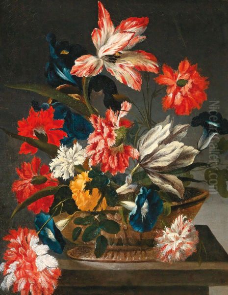 Flowers in a decorative vase on a stone ledge - view 1
