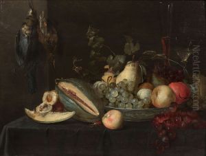 Cup of fruit on an entablature and hanging bird by Pieter Van Overschie