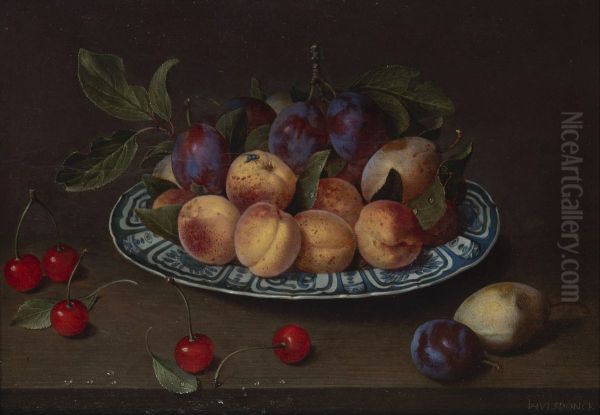 Platter of plums, peaches and pears with cherries on a table - view 1