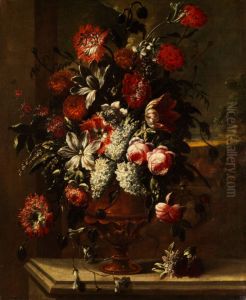 Flowers in an urn on a stone ledge