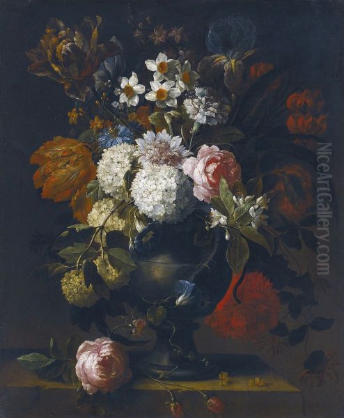 Still life of guelder roses, tulips, daffodils, an iris, a peony and other flowers in a vase on a stone ledge - view 1