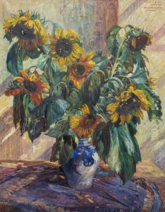 Flowers in a vase on a table Flowers in a vase on a table