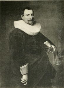 Portrait of a man holding a hat and gloves by Nicolaes Eliaszoon Pickenoy
