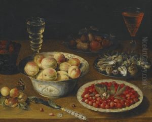 Fruit still life with two wine glasses on a wooden table