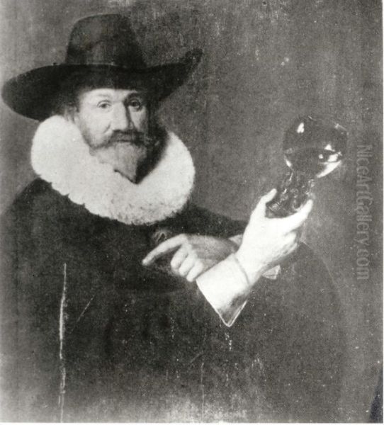 Portrait of a man with a cup. - view 1