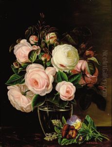 White and pink roses in a glass vase. White and pink roses in a glass vase.