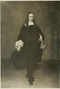 Portrait of a man holding a hat