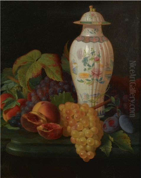 A FAMILLE ROSE VASE WITH GRAPES, PEACHES, PLUMS AND APRICOTS ON A TABLE - view 1