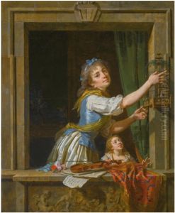 A young woman setting a bird free from a cage at an open window A young woman setting a bird free from a cage at an open window