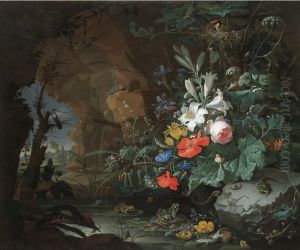 Interior of a grotto with a rock-pool, frogs, salamanders and a bird's nest