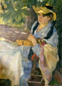 Lady sitting under trees