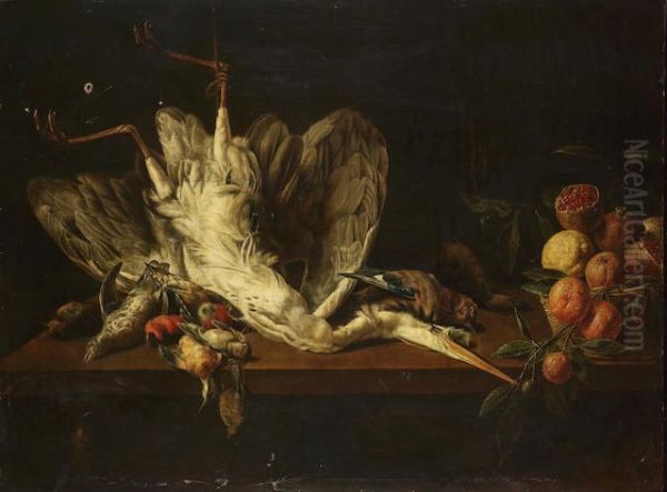 A dead heron with a dead duck, jay, finches, kingfisher and other birds on a table top with a basket of pomegranates and oranges - view 1
