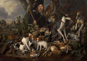Gentleman hunter with his pack of dogs and hunting trophies