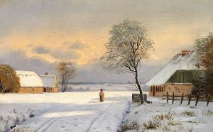 A snow covered road with a woman.