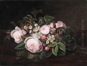 Opstilling med lyserode roser og aebleblomster pa en stenkarm.