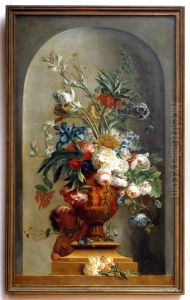 Putti playing with flowers of a garden ornament