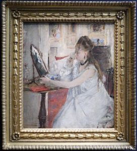giovane donna che si impomata by Berthe Morisot