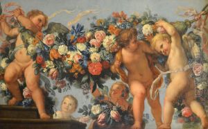 Amours et guirlande de fleurs