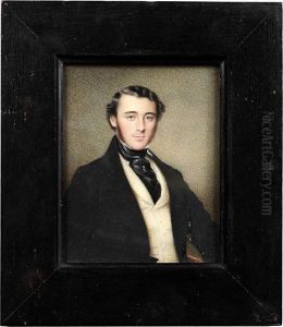 Two Portrait Miniatures Of A Gentleman And A Lady